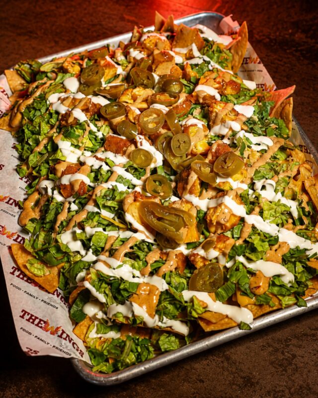 Nachos just got promoted. 👊

House chips piled high with melted cheese, crispy buffalo chicken, pico de gallo, sour cream, chipotle mayo and jalapeños. Built to share — but no judgment if you don’t.

The Wings Stadium · McAllen

#thewingsstadium #panchos #rgveats